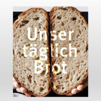Zwei Brot-Hälften mit dem weißen Schriftzug: Unser täglich Brot.